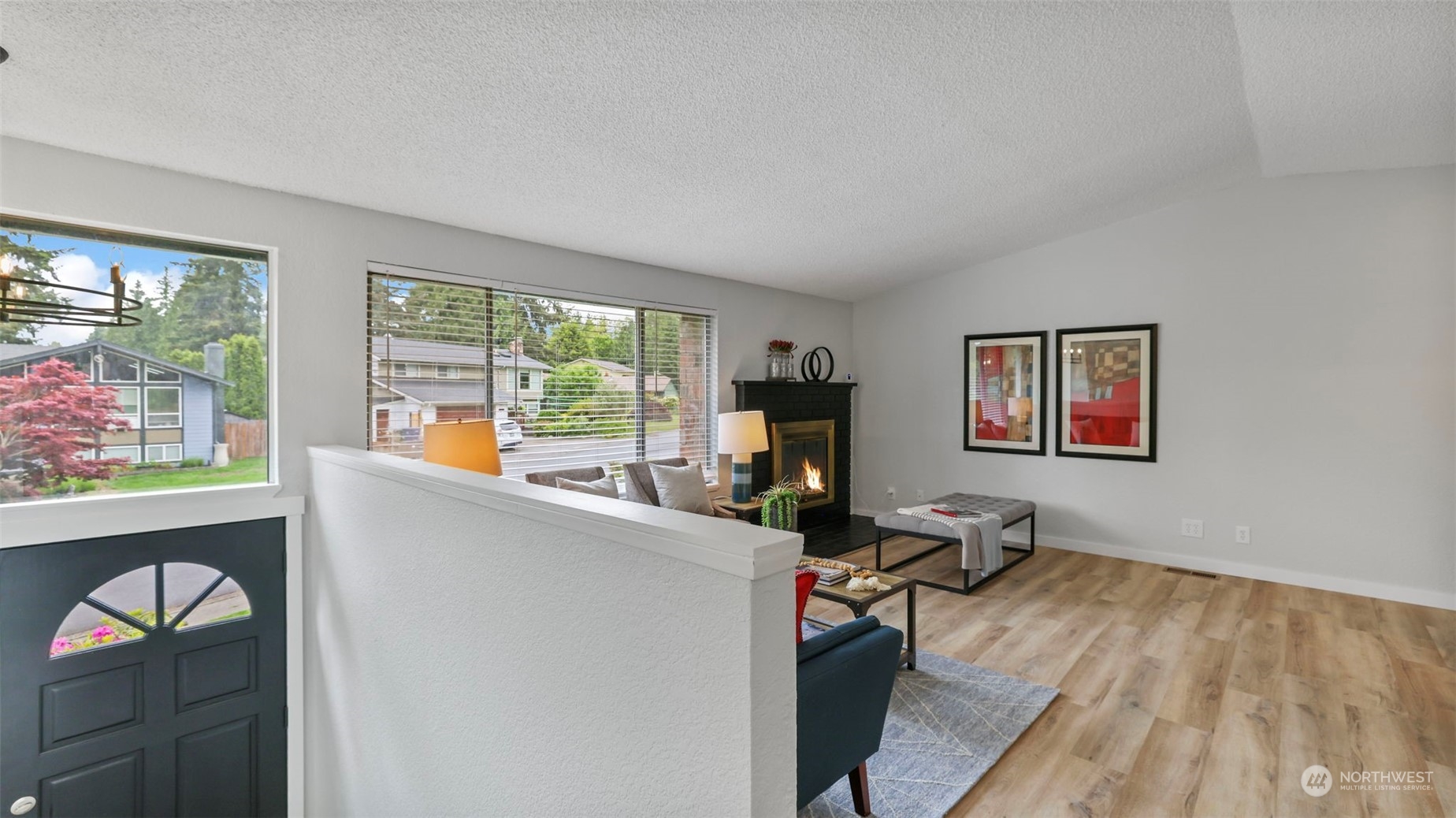 2424 170th Street Southeast Bothell, WA 98012 - Photo 9 of 40 a room with wooden floor and a window
