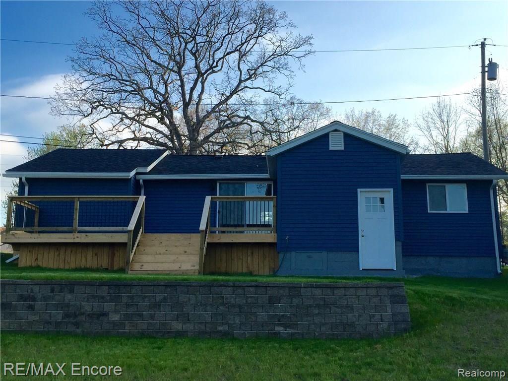 7252 Clement Road Clarkston, MI 48346 - Photo 24 of 25 NEW siding, deck, windows, shingles, doors, retaining wall, septic field and well..... stop in and check this beauty out!