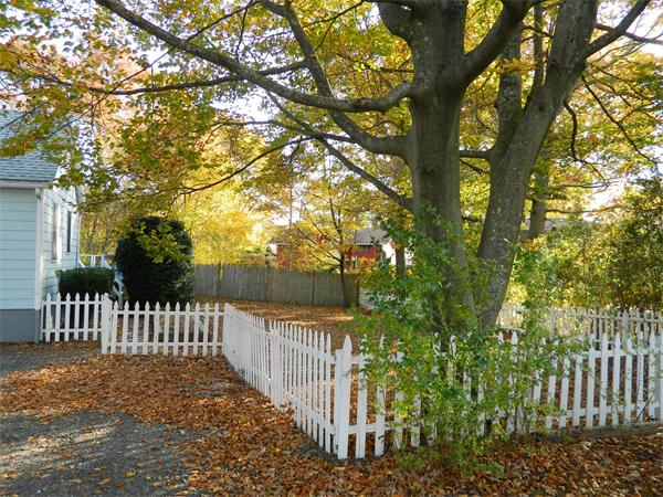 22-24 Puritan Road Marblehead, MA 01945 - Photo 15 of 15 a view of a house with a small yard