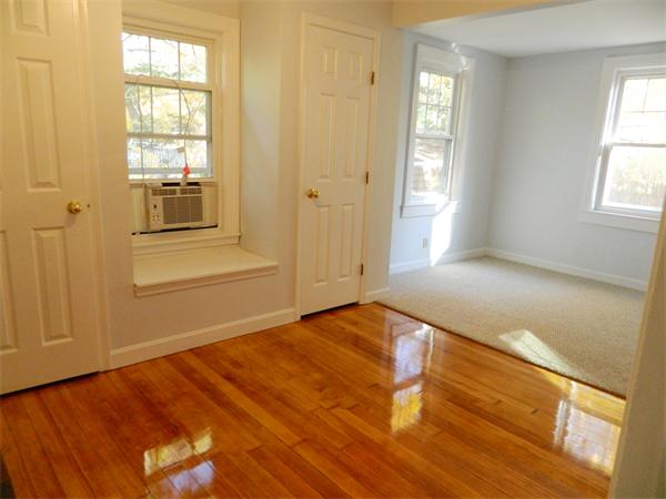 22-24 Puritan Road Marblehead, MA 01945 - Photo 6 of 15 a view of an empty room and window
