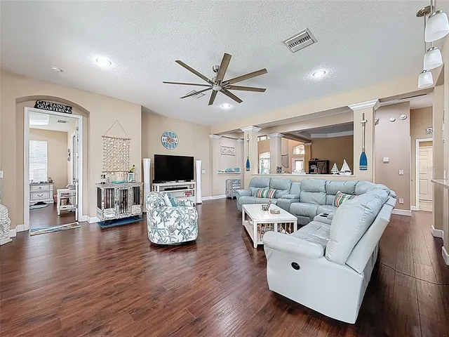a open kitchen with stainless steel appliances granite countertop a stove and cabinets