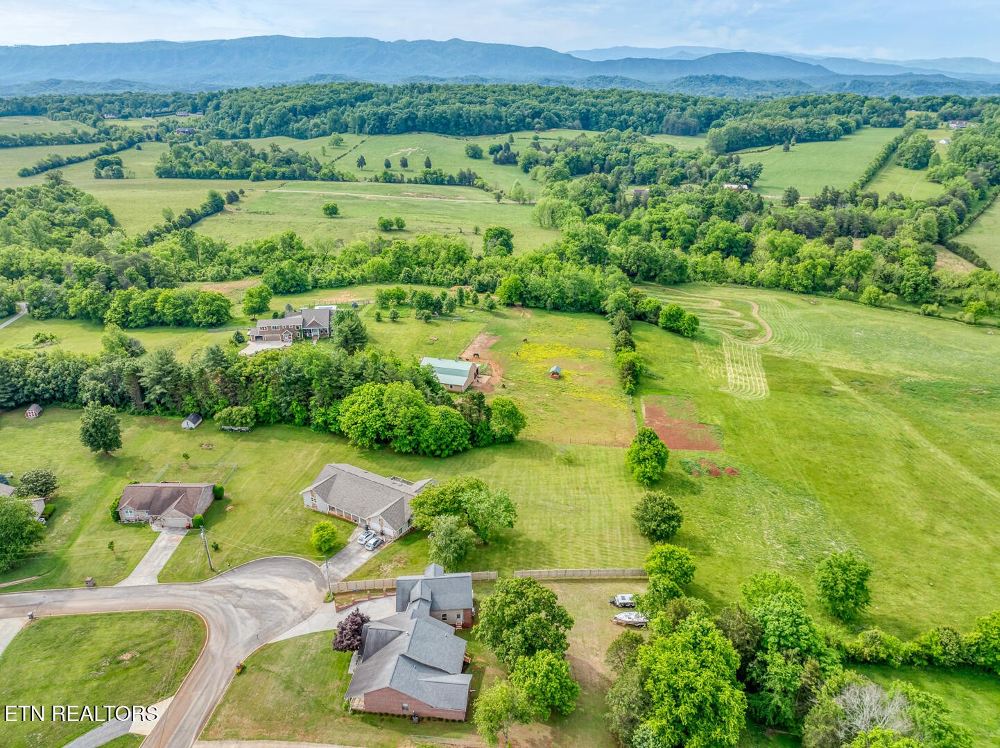 449 Foss Road Maryville, TN 37801 - Photo 9 of 49 an aerial view of green landscape with trees houses and back yard
