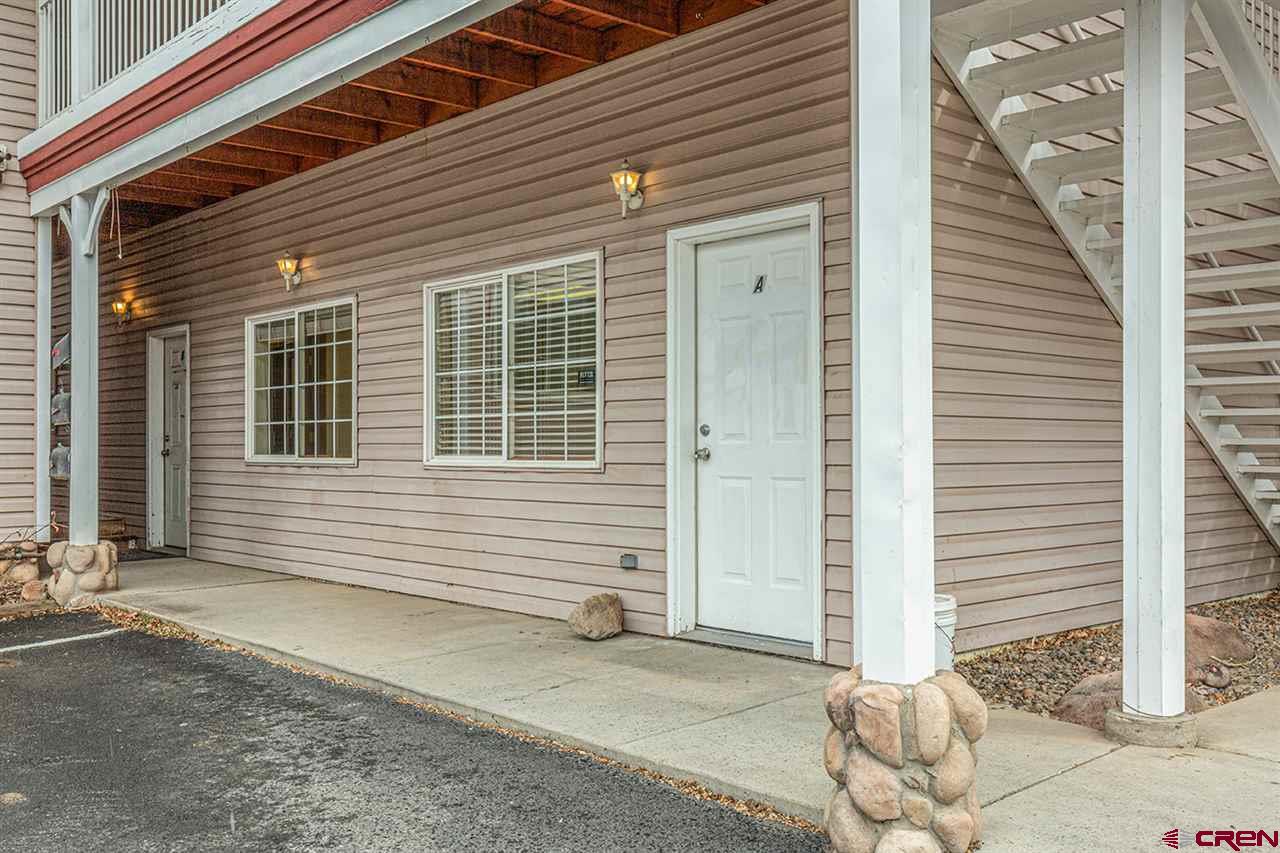 a view of a house with a door and chair