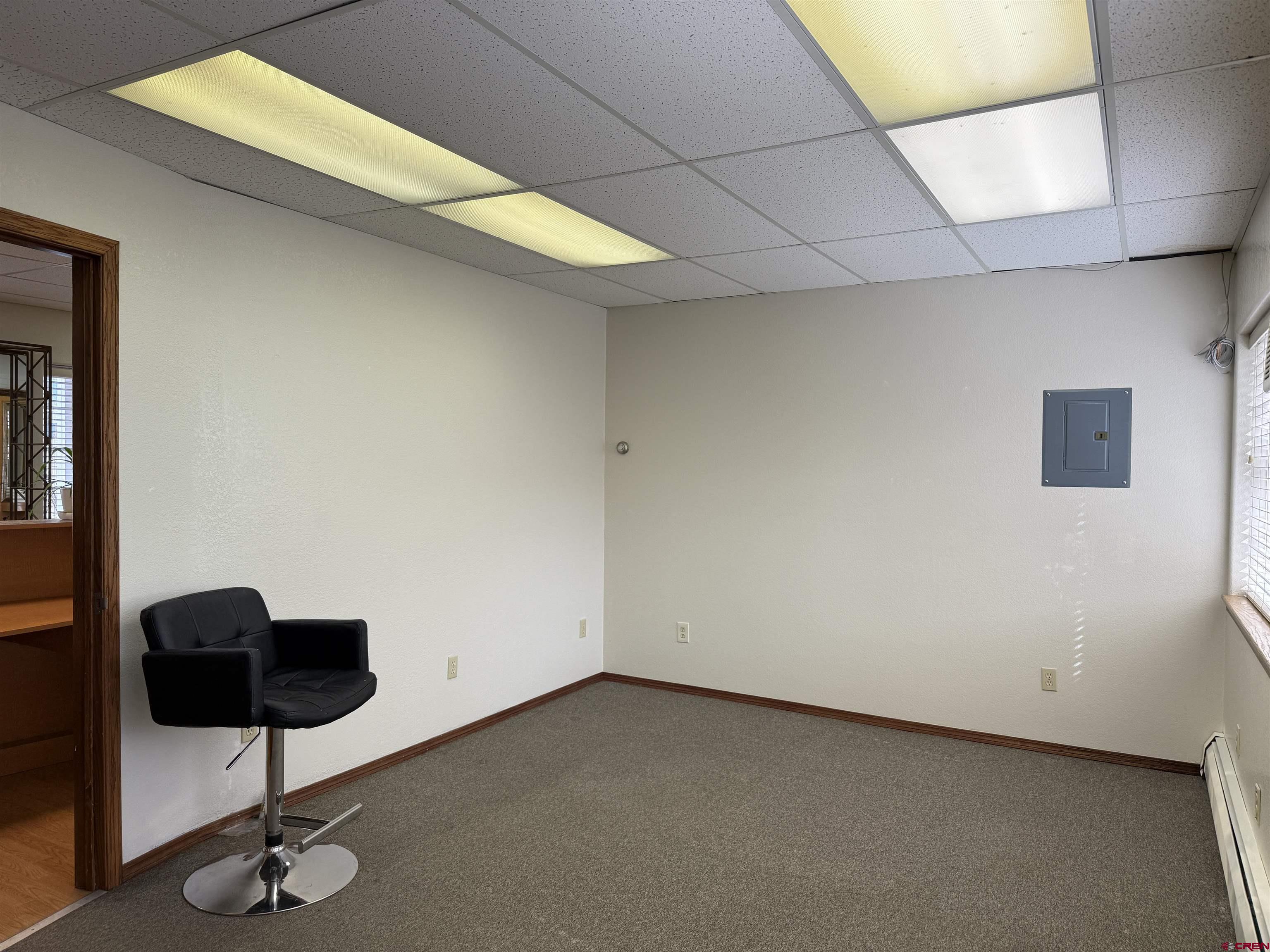 1666 Main Avenue, Unit A Durango, CO 81301 - Photo 11 of 28 a view of room and hall with wooden floor