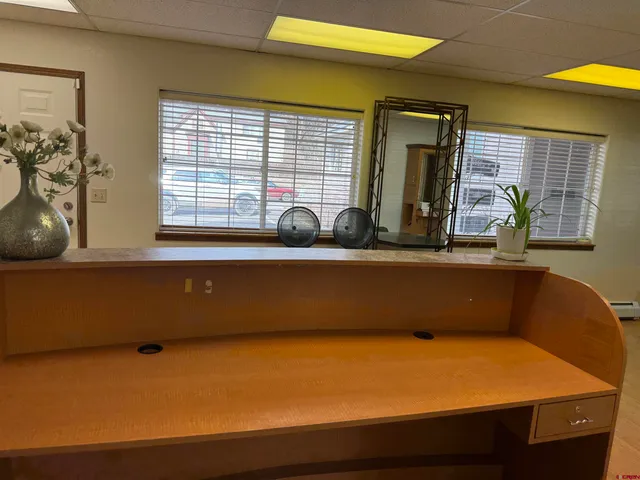 a view of a livingroom and a bathroom