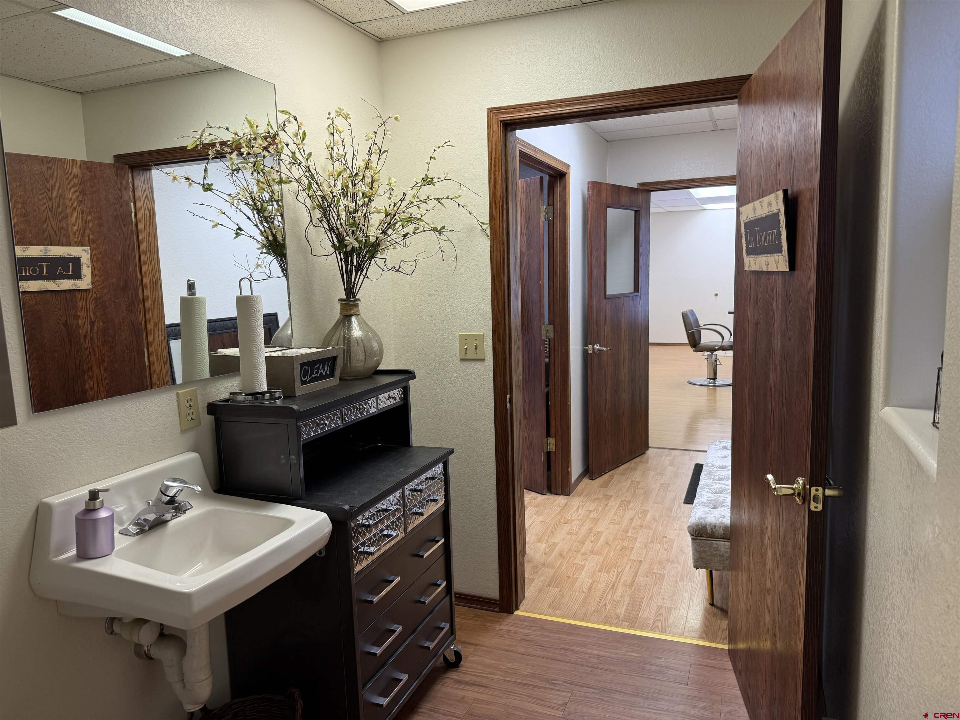 1666 Main Avenue, Unit A Durango, CO 81301 - Photo 18 of 28 a bathroom with a sink and a mirror