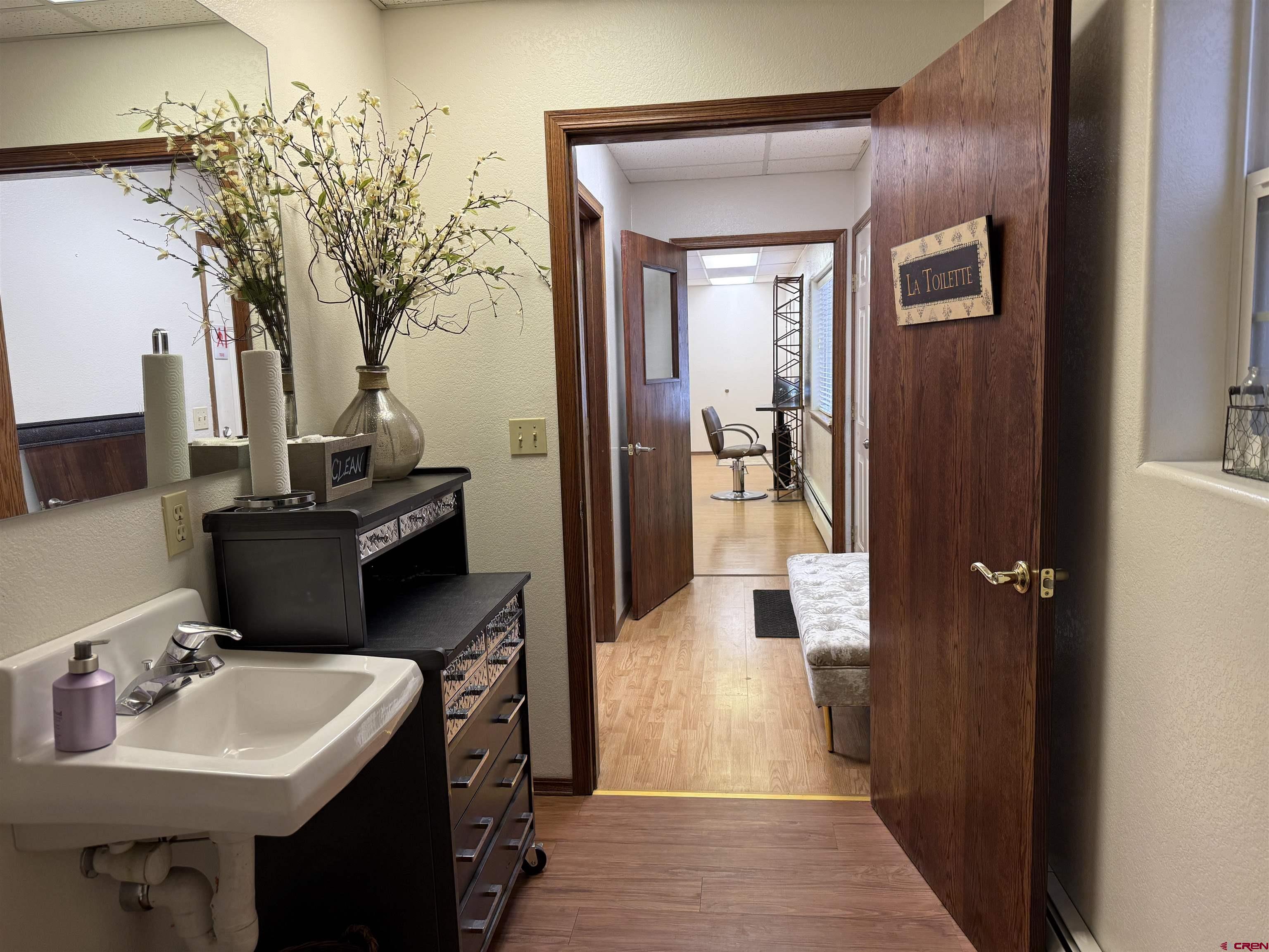 1666 Main Avenue, Unit A Durango, CO 81301 - Photo 19 of 28 a bathroom with a sink and mirror
