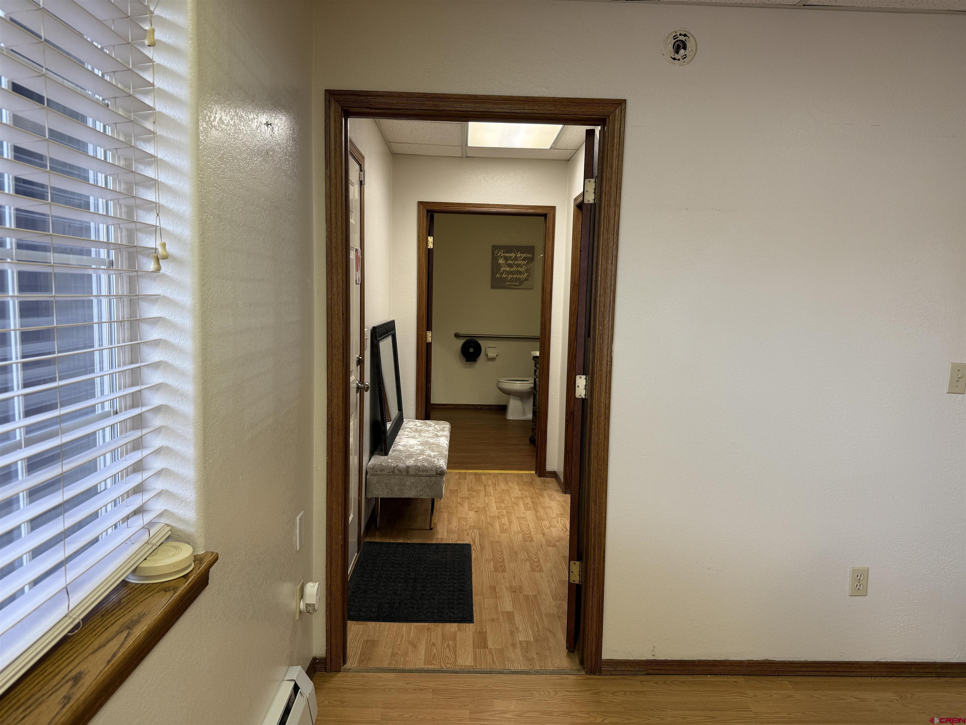 1666 Main Avenue, Unit A Durango, CO 81301 - Photo 20 of 28 a view of a hallway with a living room