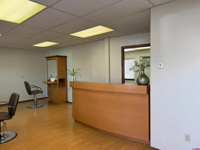 a workspace with furniture and a couch