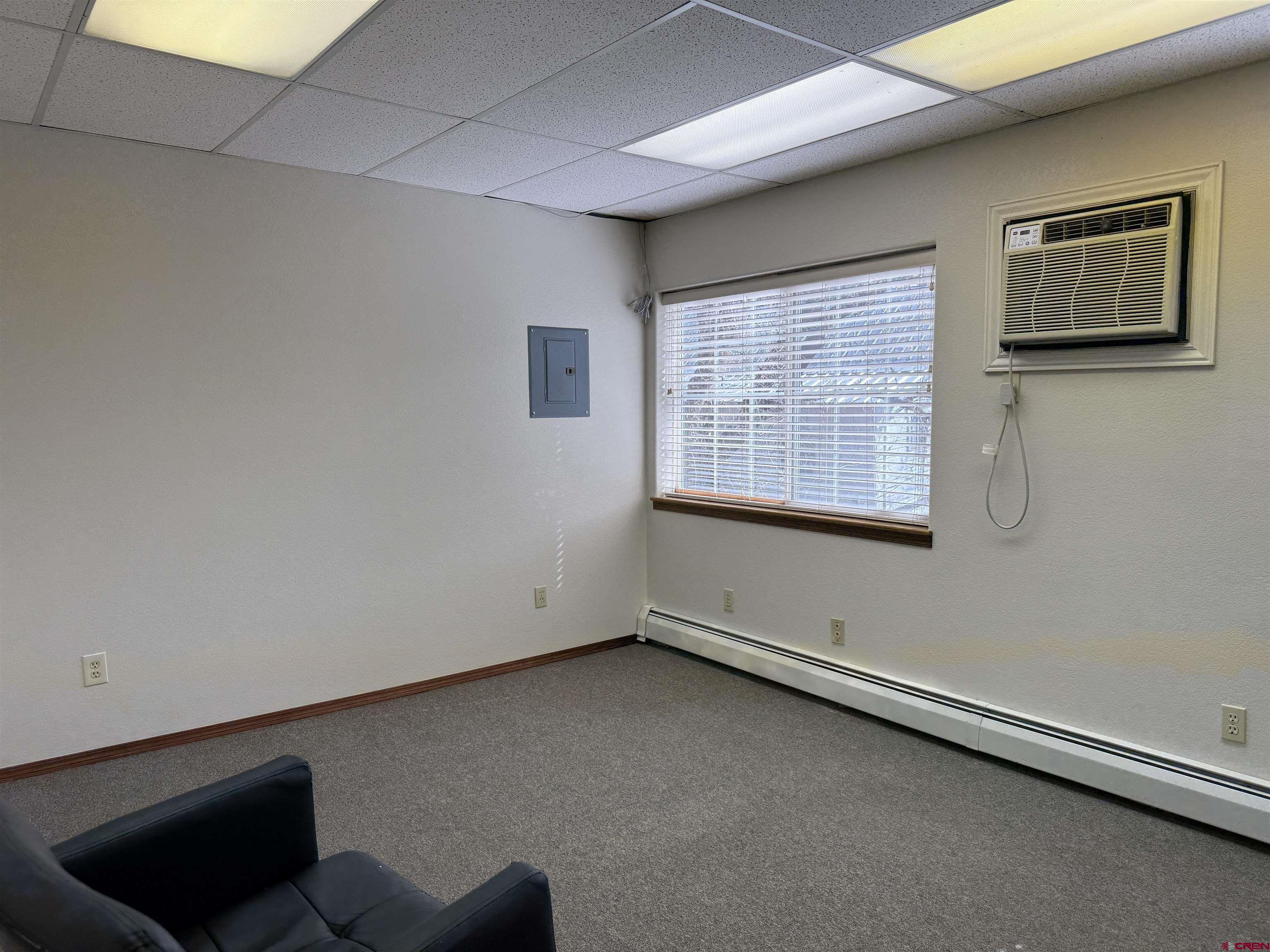 1666 Main Avenue, Unit A Durango, CO 81301 - Photo 10 of 28 an empty room with windows