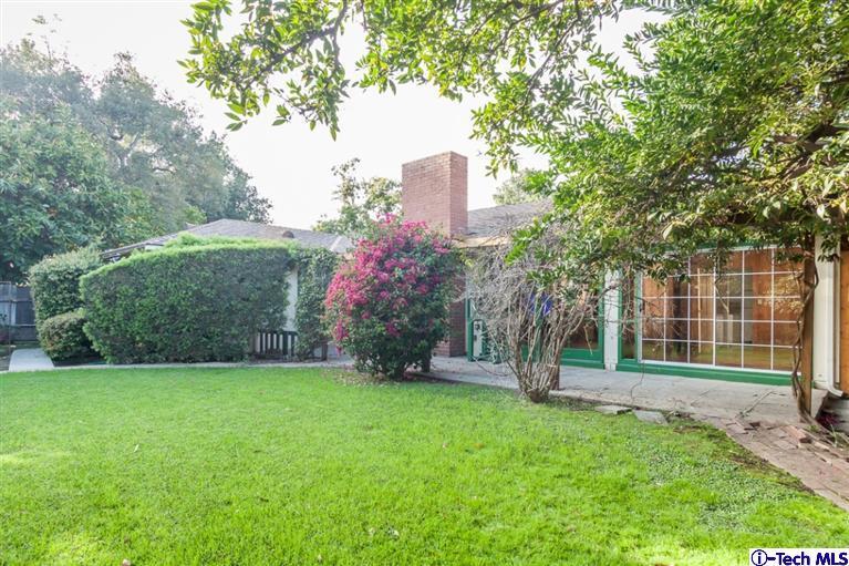 2924 Lombardy Road Pasadena, CA 91107 - Photo 14 of 20 a view of a house with backyard and a tree