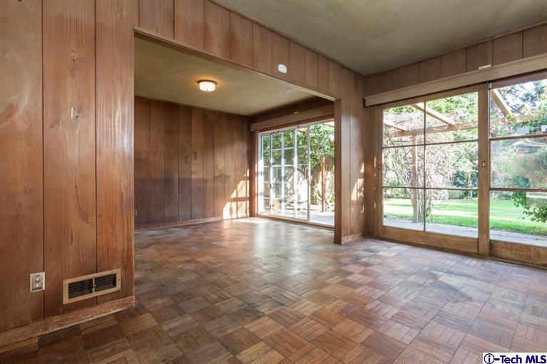 2924 Lombardy Road Pasadena, CA 91107 - Photo 5 of 20 a view of an empty room with a sliding door