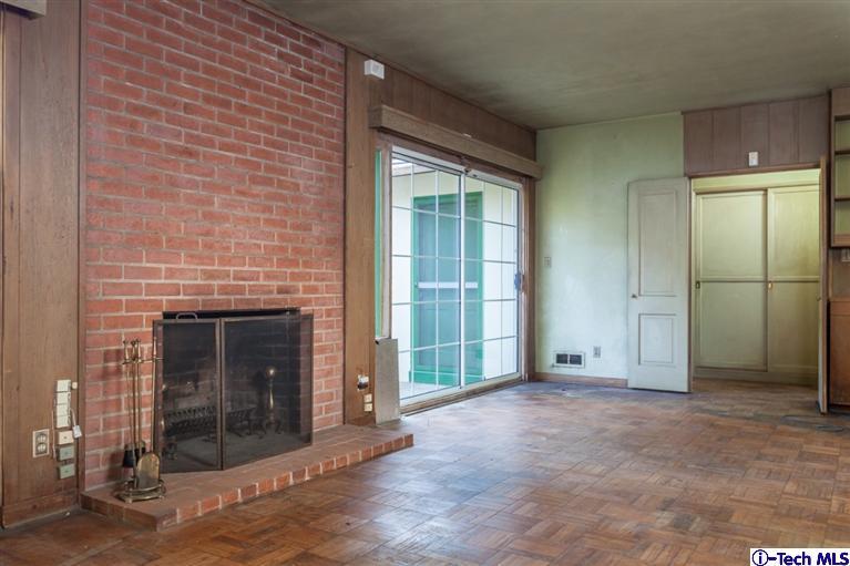 2924 Lombardy Road Pasadena, CA 91107 - Photo 6 of 20 a view of an empty room with a fireplace