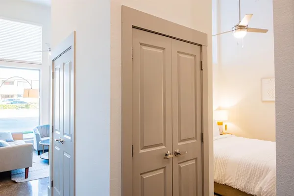 a view of a bedroom from a hallway