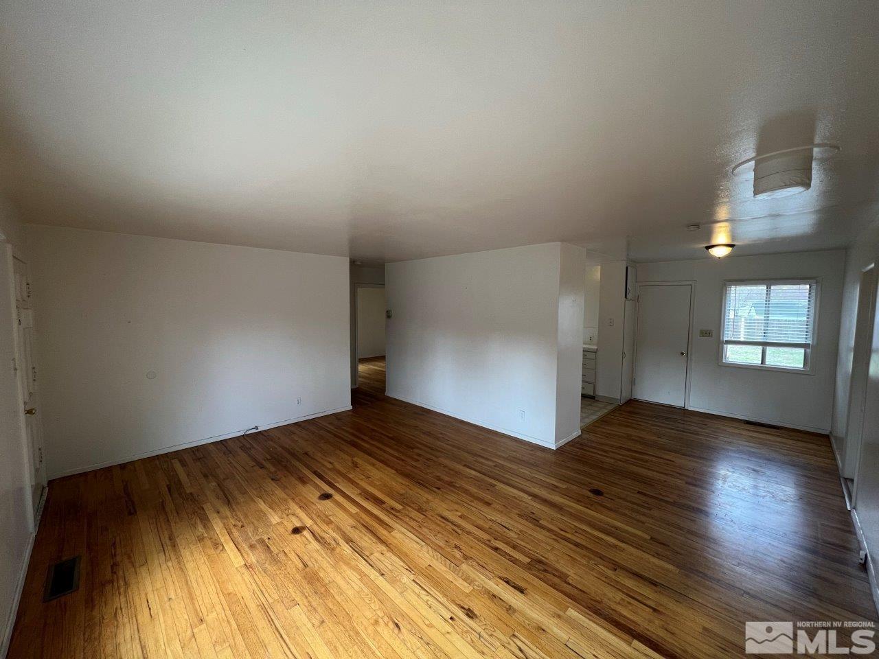 1240 Wesley Drive Reno, NV 89503 - Photo 8 of 17 a view of empty room with wooden floor