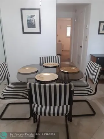 a view of a hallway with elevator