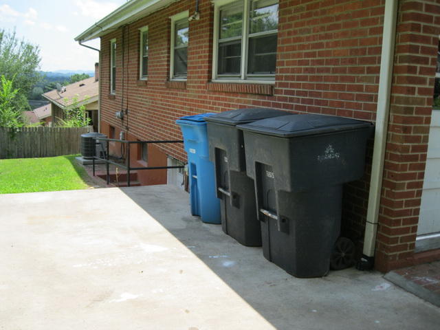337 Cherryhill Road Northwest Roanoke, VA 24017 - Photo 14 of 14 a view of a house with a yard and garage