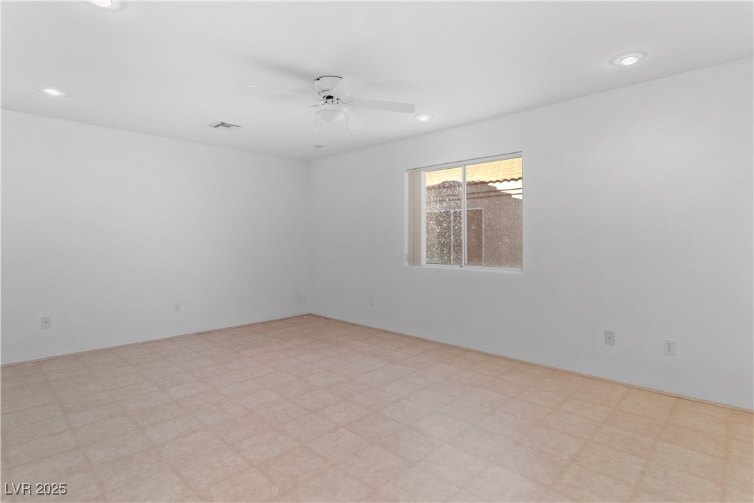 1200 Golf Club Drive Laughlin, NV 89029 - Photo 36 of 87 Hobby room or exercise room featuring a ceiling fan, recessed lighting, and light flooring