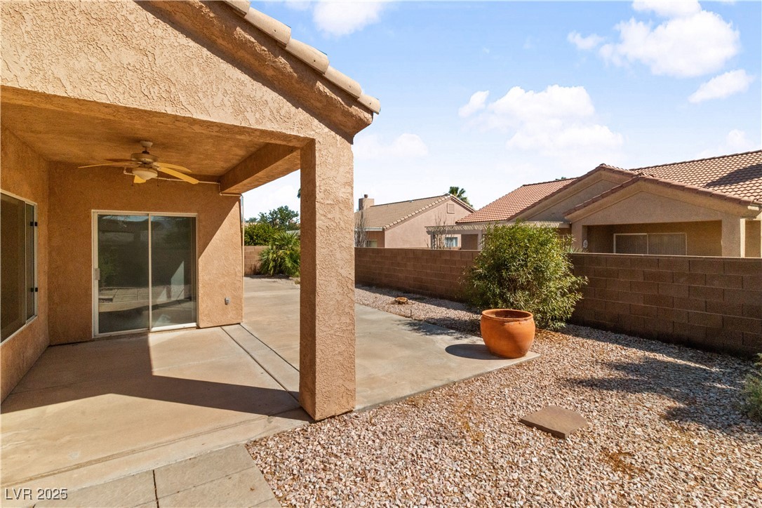 1200 Golf Club Drive Laughlin, NV 89029 - Photo 54 of 87 Fenced backyard with ceiling fan and a patio area