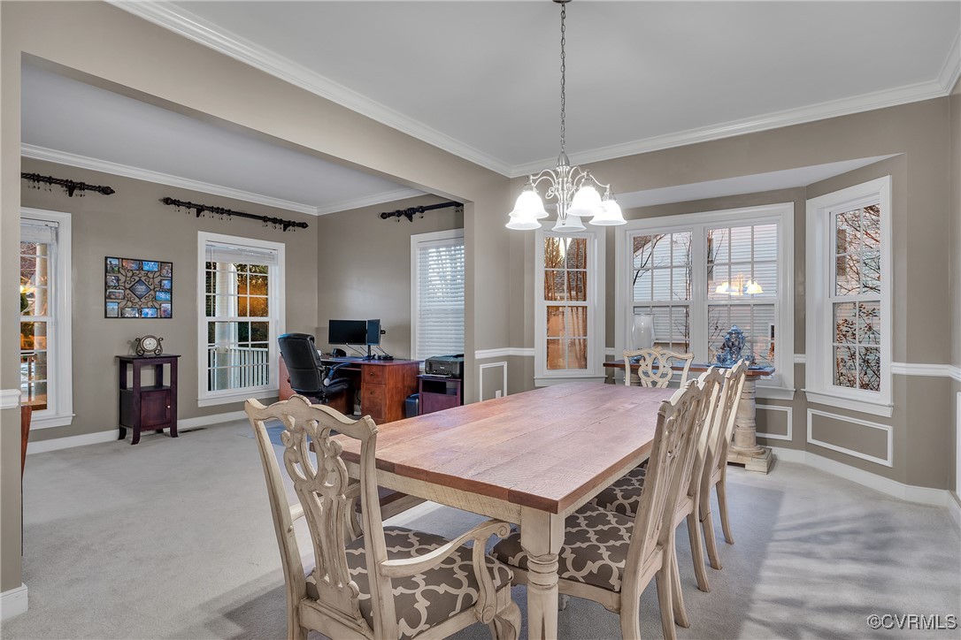 14518 Shipborne Road Midlothian, VA 23112 - Photo 15 of 50 a view of a dining room with furniture window and wooden floor