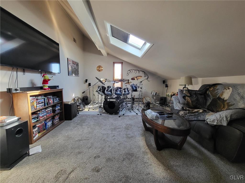 637 5th Street Whitehall, PA 18052 - Photo 14 of 25 a living room with lots of furniture and a flat screen tv
