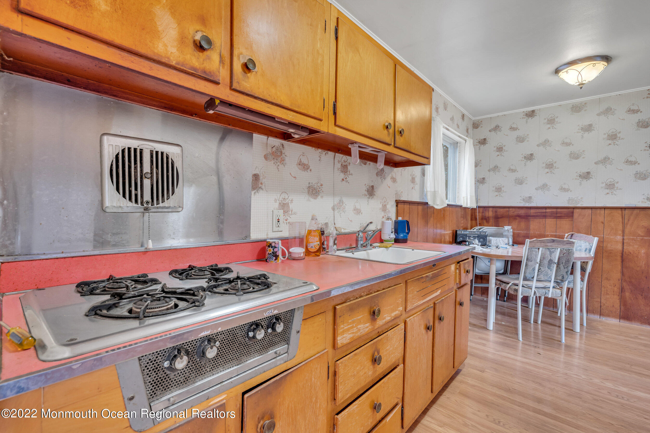 322 Bellanca Road Brick, NJ 08723 - Photo 15 of 23 a kitchen with a stove and cabinets