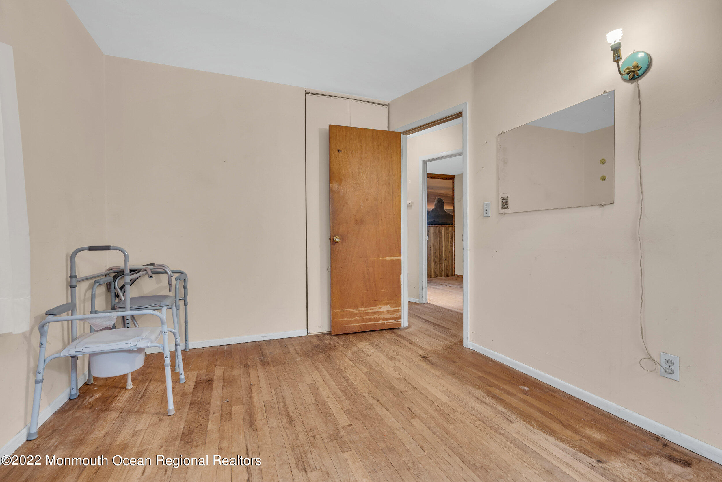 322 Bellanca Road Brick, NJ 08723 - Photo 21 of 23 a view of a room with wooden floor table and closet
