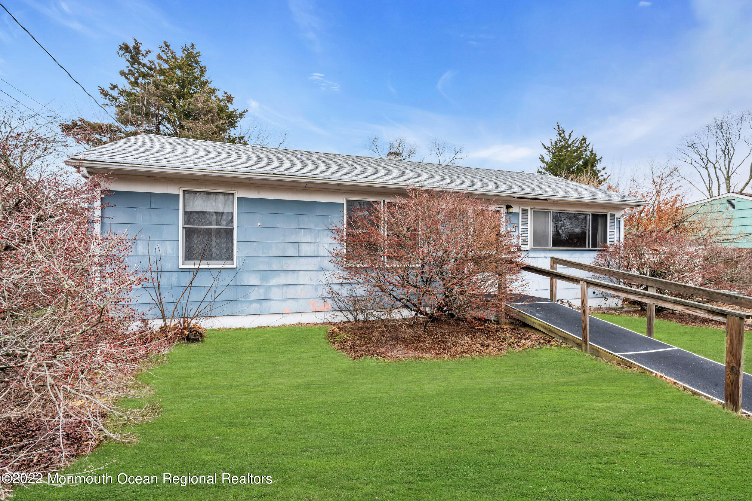 322 Bellanca Road Brick, NJ 08723 - Photo 5 of 23 a view of a backyard with plants and a garden