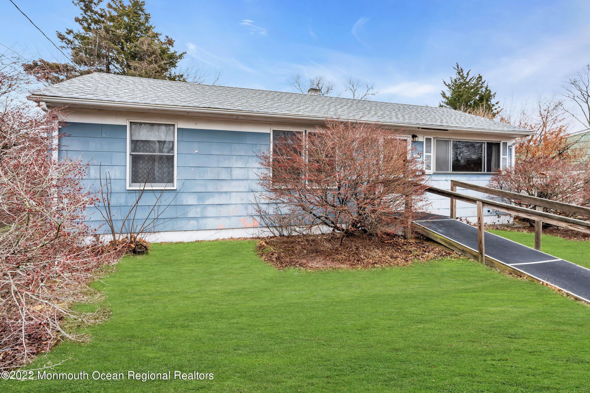322 Bellanca Road Brick, NJ 08723 - Photo 6 of 23 a front view of house with yard and outdoor seating