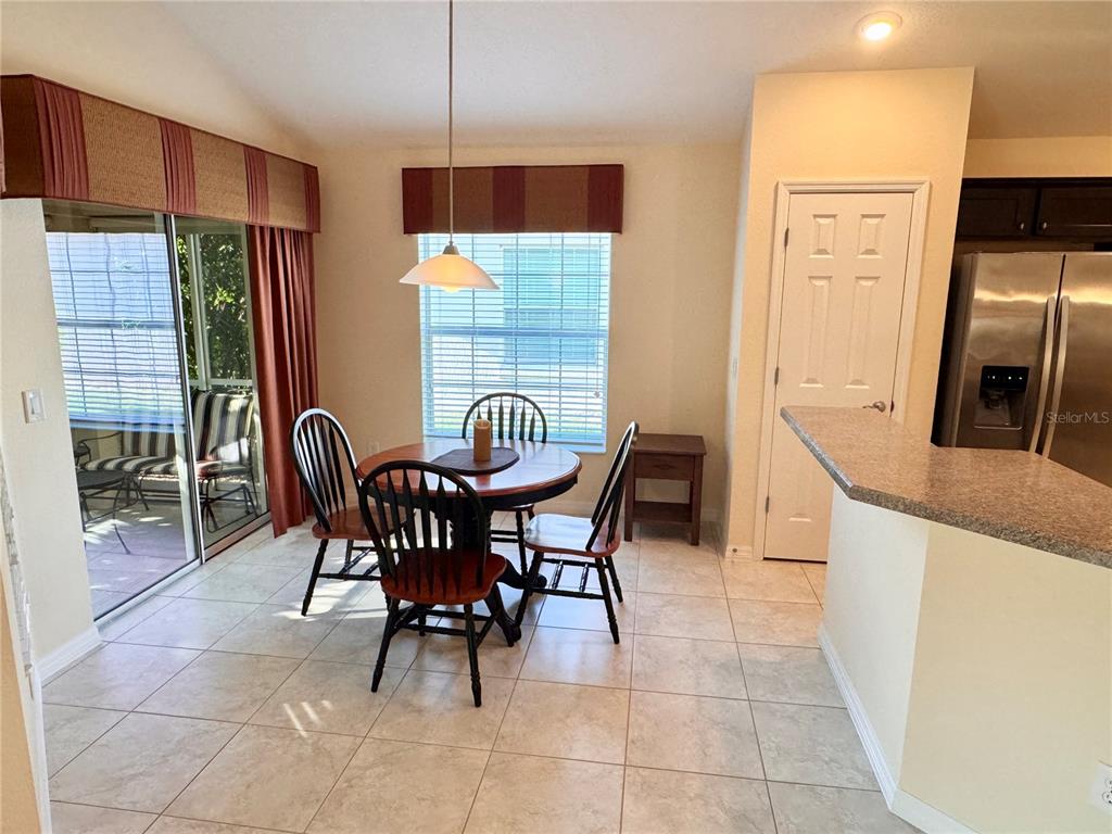 2184 Markridge Loop The Villages, FL 32162 - Photo 11 of 35 a view of a dining room with furniture