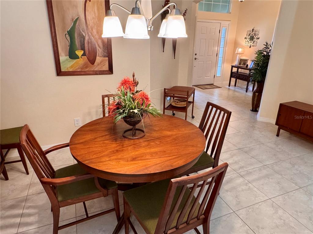 2184 Markridge Loop The Villages, FL 32162 - Photo 4 of 35 a view of a dining room with furniture