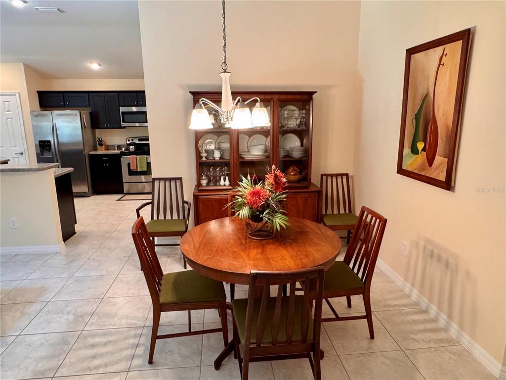 2184 Markridge Loop The Villages, FL 32162 - Photo 5 of 35 a view of a dining room with furniture