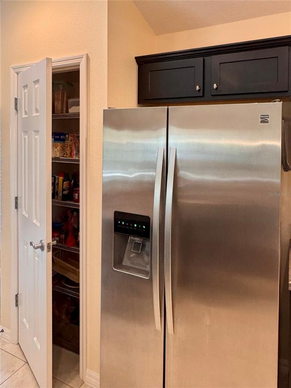 2184 Markridge Loop The Villages, FL 32162 - Photo 8 of 35 a close view of a refrigerator in kitchen