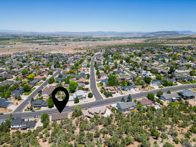 790 East Fiddlers Canyon Road Cedar City, UT 84721 - Photo 29 of 35 Residential neighborhood featuring a variety of single-family homes, paved roads, and mature landscaping