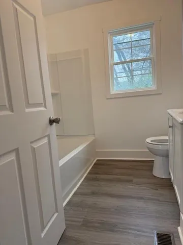 a bathroom with a sink and a toilet