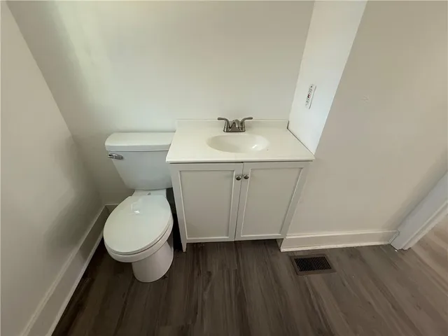 a bathroom with a sink and a toilet