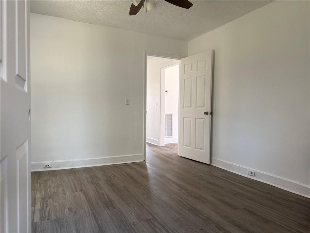 1325 Highway 41 Calhoun, GA 30701 - Photo 15 of 19 a view of an empty room with wooden floor