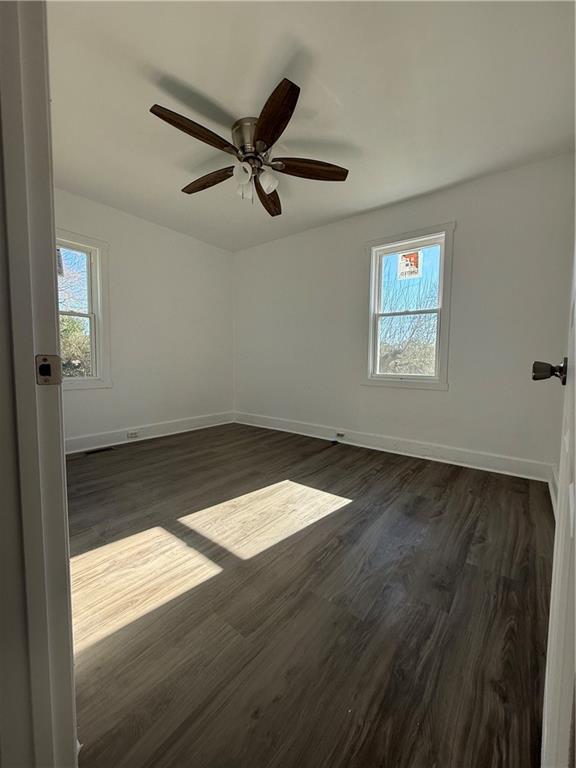 1325 Highway 41 Calhoun, GA 30701 - Photo 17 of 19 a view of empty room with wooden floor and fan