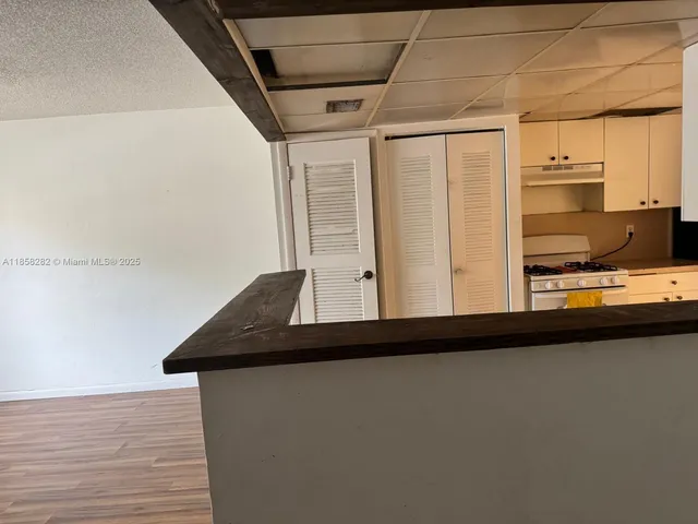 a view of a air conditioner and an empty room