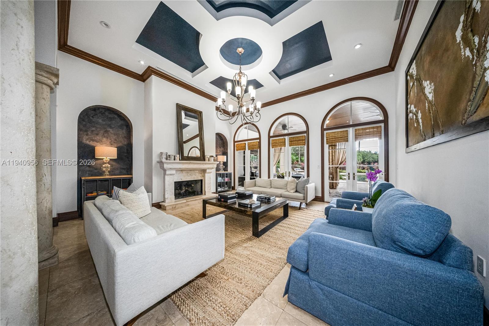 7538 Southwest 64th Street Miami, FL 33143 - Photo 11 of 78 a living room with fireplace furniture and a large window