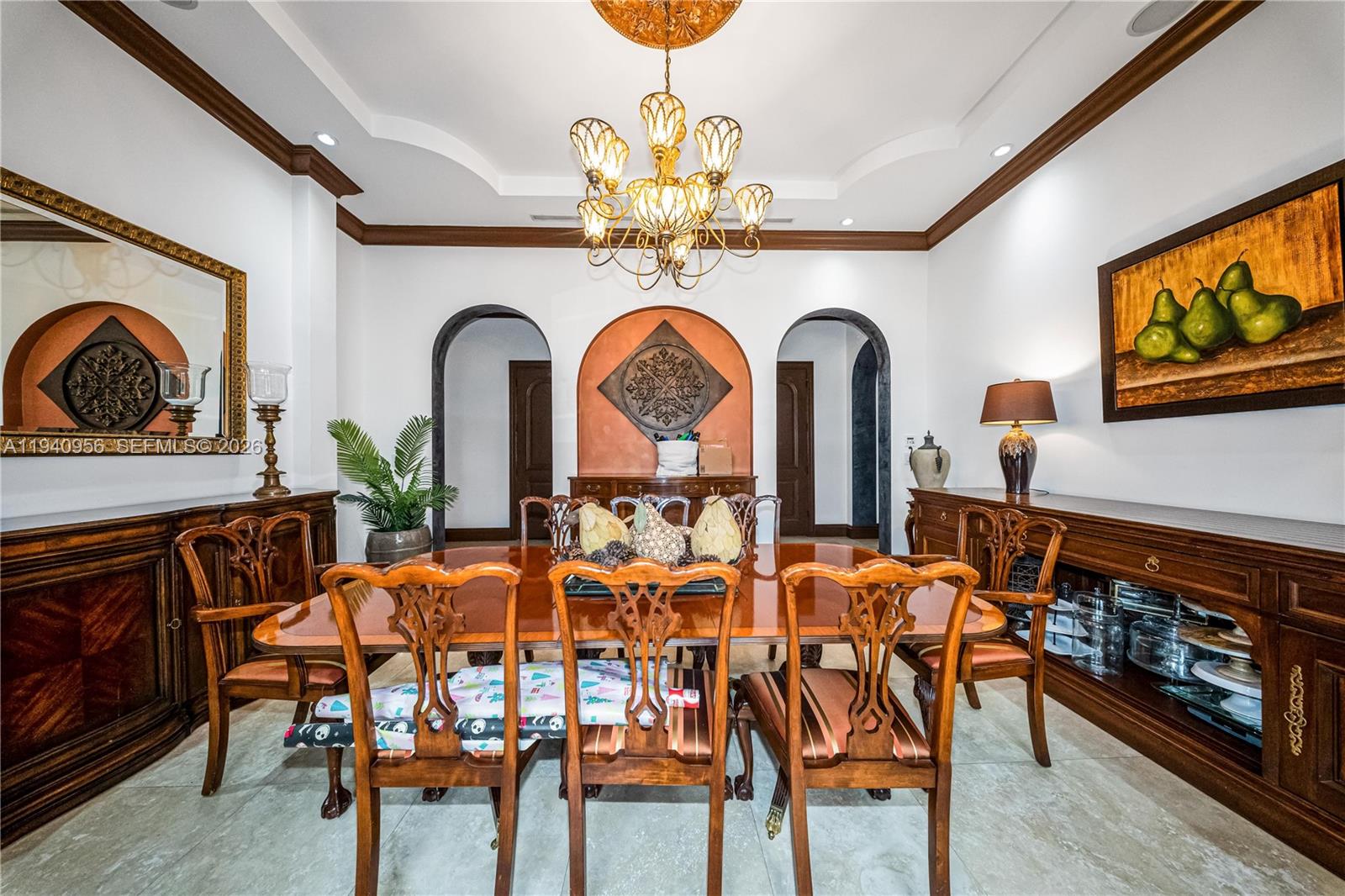 7538 Southwest 64th Street Miami, FL 33143 - Photo 23 of 78 a view of a dining room with furniture and chandelier