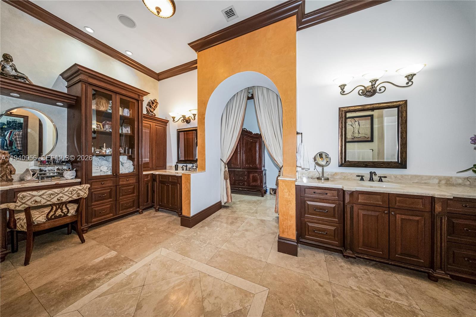 7538 Southwest 64th Street Miami, FL 33143 - Photo 34 of 78 a spacious bathroom with a double vanity sink and a mirror