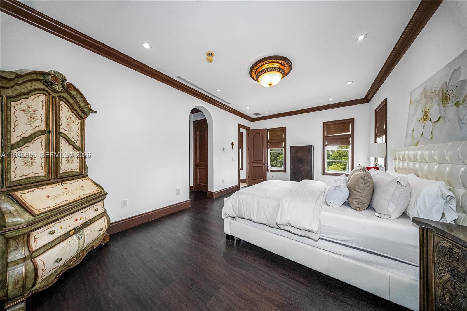 7538 Southwest 64th Street Miami, FL 33143 - Photo 60 of 78 a bedroom with a bed and a window