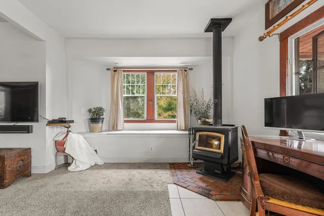 a kitchen with lots of counter top space and wooden floor