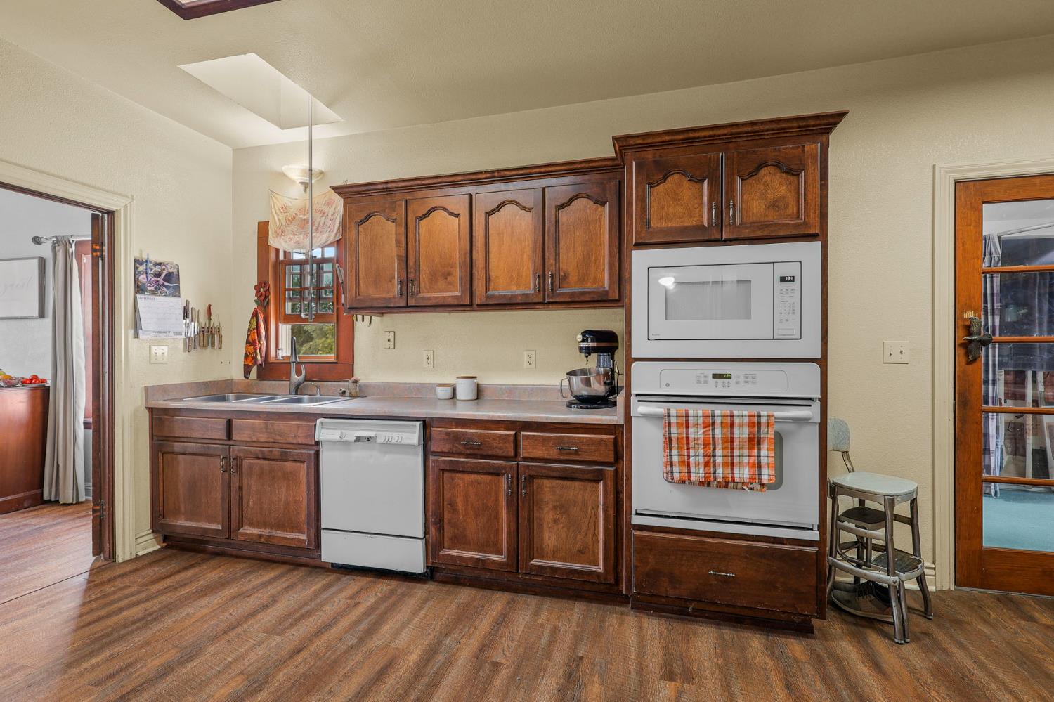 18525 Emerson Road Red Bluff, CA 96080 - Photo 17 of 92 a kitchen with stainless steel appliances granite countertop a refrigerator and stove top oven
