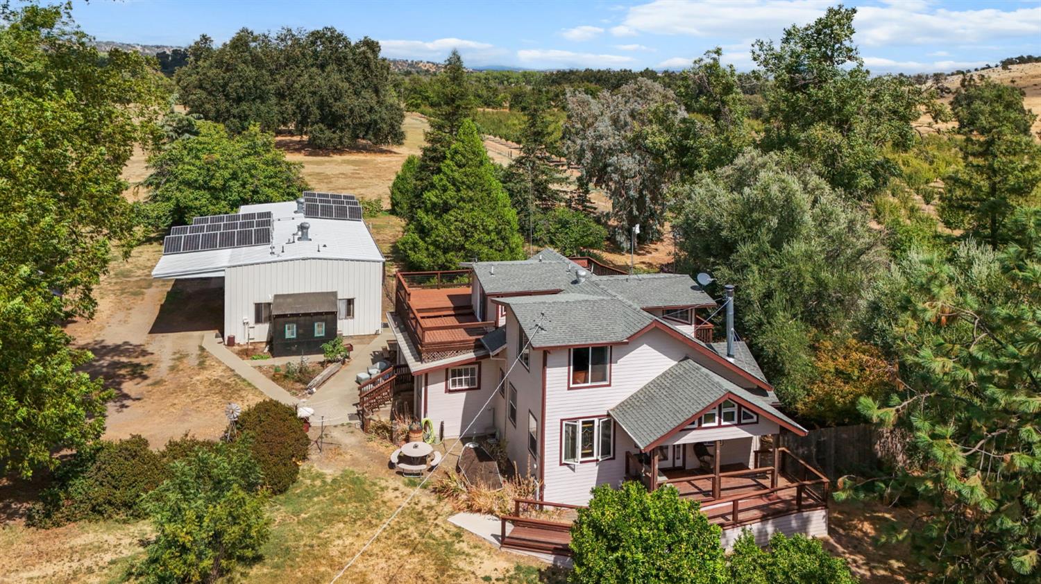 18525 Emerson Road Red Bluff, CA 96080 - Photo 3 of 92 an aerial view of a house with a yard
