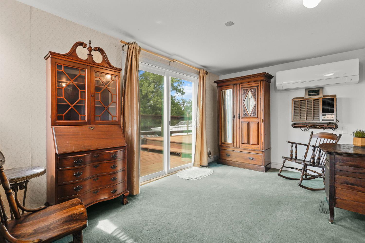 18525 Emerson Road Red Bluff, CA 96080 - Photo 31 of 92 a view of an empty room with furniture and a window