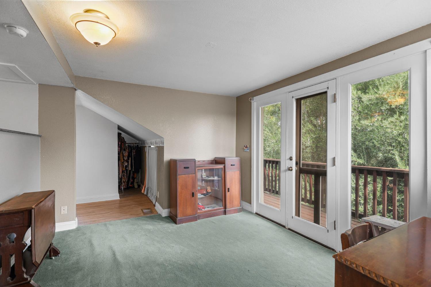 18525 Emerson Road Red Bluff, CA 96080 - Photo 35 of 92 a view of an empty room with a fireplace and a window