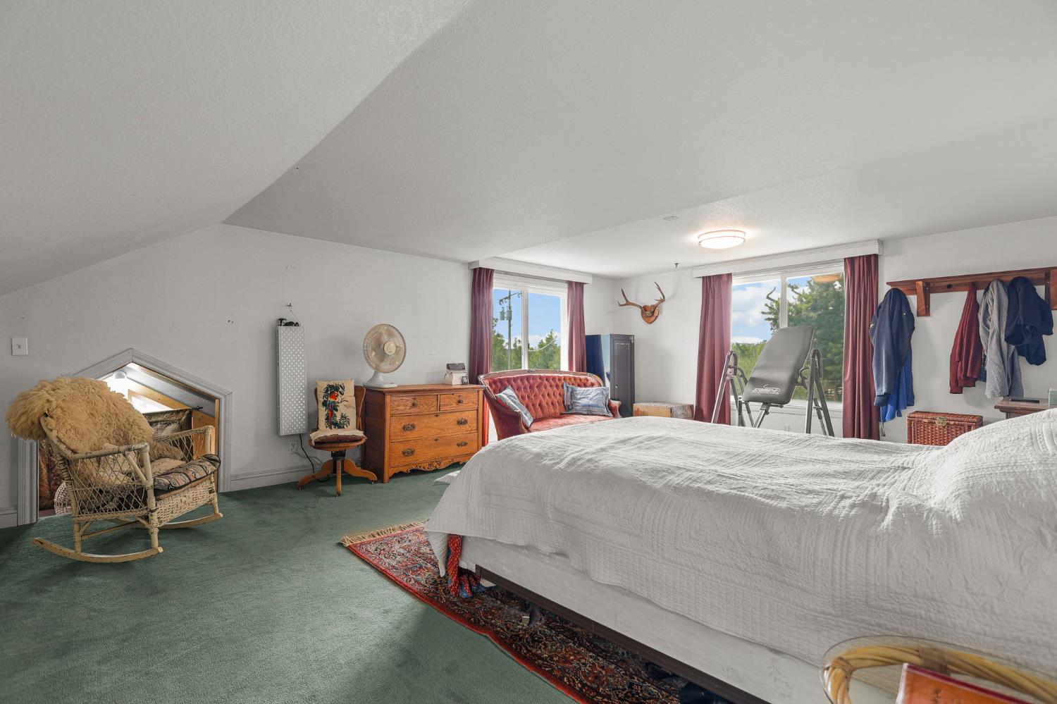 18525 Emerson Road Red Bluff, CA 96080 - Photo 36 of 92 a bedroom with a bed and a large window