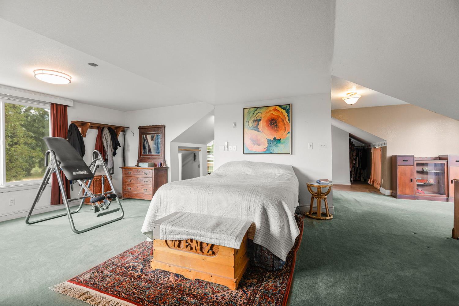 18525 Emerson Road Red Bluff, CA 96080 - Photo 37 of 92 a bed room with a bed and a rug